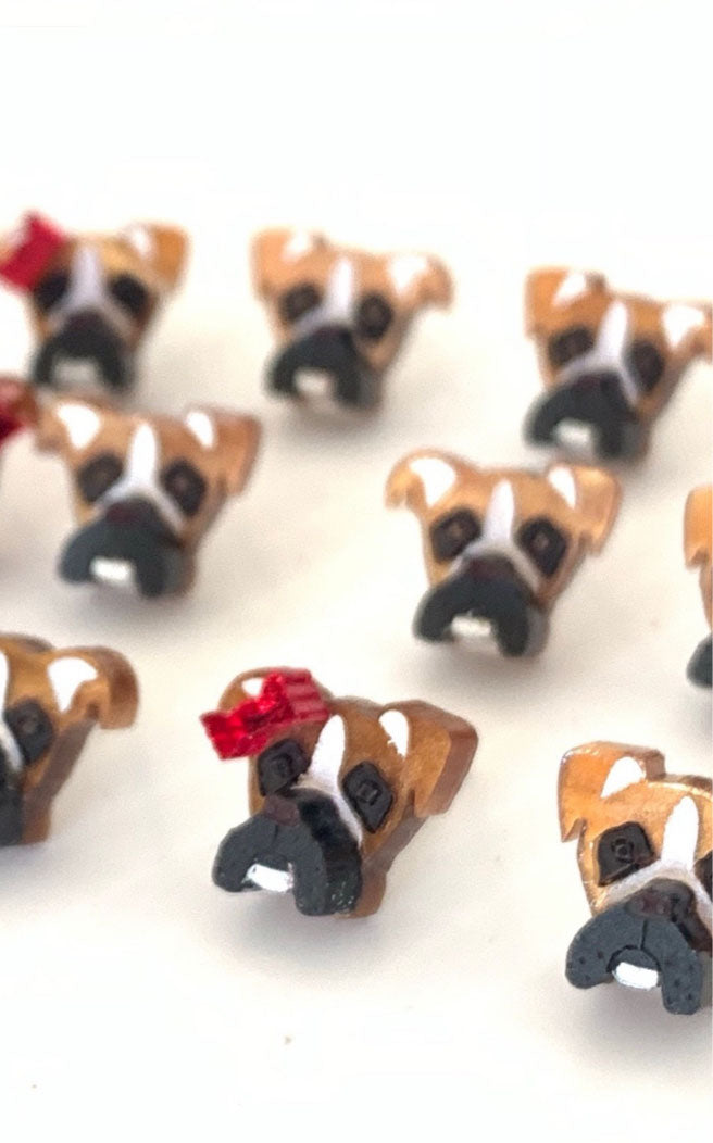 Acrylic dog earrings on white background